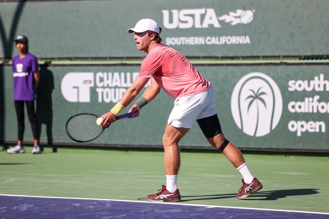 Professional playing tennis in solstice gear